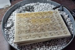 Fine silver links laid out for fusing