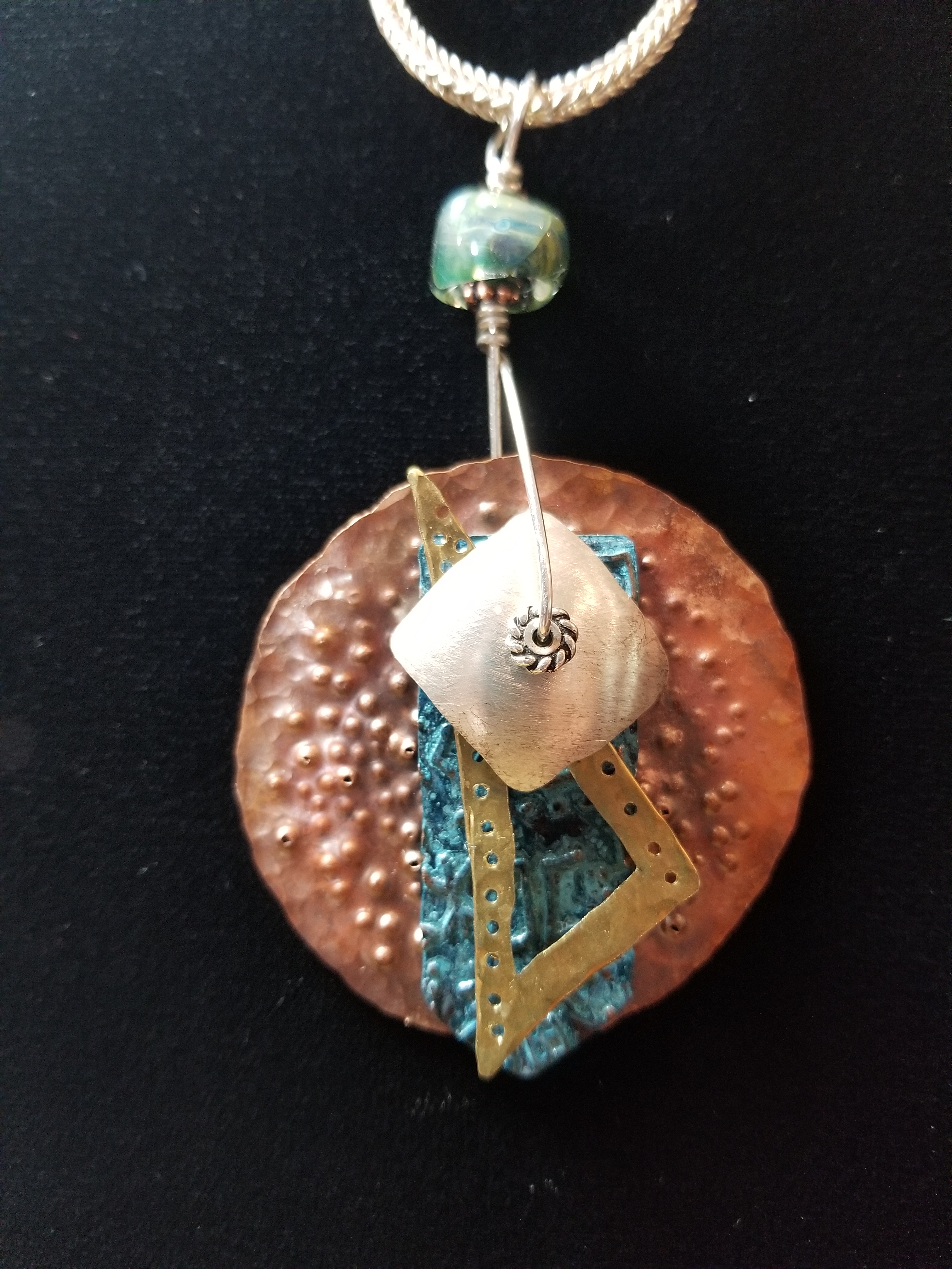 Silver, Copper, and Brass Stacked Spinner Pendant